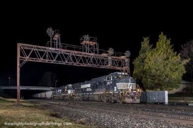 A loaded Norfolk Southern coal train 590 destined for the port of Baltimore passes under this classic Pennsylvania Railroad signal bridge at Summerhill, PA just after midnight on February 20, 2017.